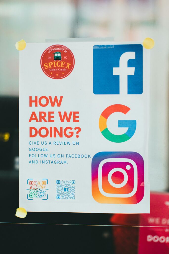 Poster encouraging reviews on Google, Facebook, and Instagram.